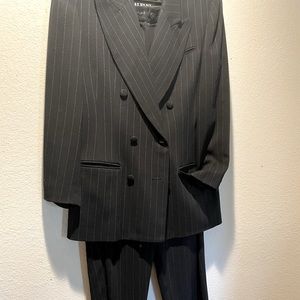 Alfani black suit with subtle white pinstripes.  Peak collar.  Lined!
